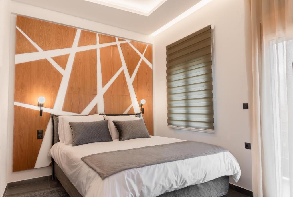 Bedroom με γεωμετρικό ξύλινο headboard